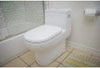 Image for 1-Piece 0.8/1.28 GPF Dual Flush Elongated Toilet in White